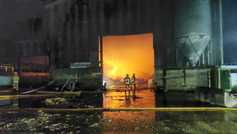 In pictures: blaze destroys machinery and fodder on farm